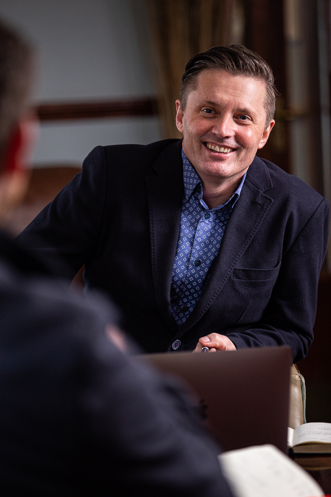 Business Coach Academy coach in a client conversation